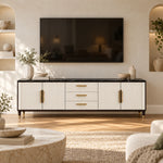 Crimpedy Black Marble Top TV Unit displays gold-tone handles together with a dark marble top beside living room seating.