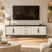 Crimpedy Black Marble Top TV Unit displays gold-tone handles together with a dark marble top beside living room seating.