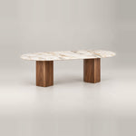 Delosita Marble Top 6-Seater Dining Table featuring warm wood grain alongside two angular block legs against a grey backdrop.