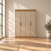 Dolbarino 4 Door Wooden Wardrobe displays chevron-patterned doors together with a wood-tone base against a bedroom wall.