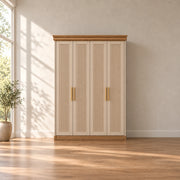 Dolbarino 4 Fluted Door Wooden Wardrobe, with brass-tone pulls and four vertically fluted doors in a furnished bedroom.