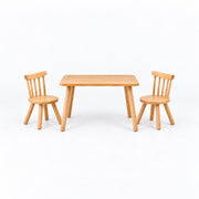 Dukyshola Wooden Kids Table with 2 Chairs in a straight-on view, showing spindle-back chairs alongside splayed round legs.