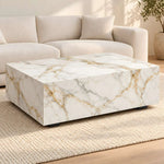 Fallinora Marble Coffee Table product photo showing marble-look block form and short feet in a clean studio setting.