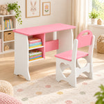 Faraliso Pink Kids Study Desk with Chair, showing a pink writing top and two left book cubbies beside a playroom window.
