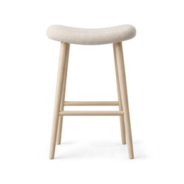 Alternate view of Fikomira Curved Upholstered Counter Stool, showing curved padded seat for a modern dining room interior.