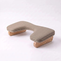 Alternate view of Flooti Beige Manicure Hand Rest, showing ergonomic curved design in a clean, contemporary salon setting.