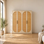 Hingimola Cream 4 Door Cane Wardrobe brings together a pale outer case and rounded woven inserts in a furnished bedroom.