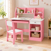 Homkona Pink Kids Study Desk with Chair featuring a pink storage hutch alongside a white desktop beside a playroom window.