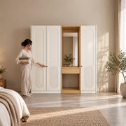 Kapilosa 3 Door Wardrobe with Dressing Mirror with a woman at the front of the wardrobe, showing small brass-tone pulls.