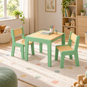 Kidmesho Kids Table with 2 Chairs featuring a square wood tabletop alongside mint-green frames beside a playroom window.