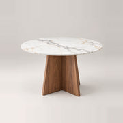 Linosola Marble Top 4-Seater Dining Table in a softly lit studio, featuring grey surface veining and warm wood grain.