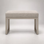 Lupendri Pedicure Footrest in a softly lit studio: a taupe metal base, open sled-style legs and square-profile supports.