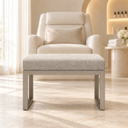 Lupendri Pedicure Footrest: a rectangular cushion, a taupe metal base and square-profile supports in a softly lit salon.