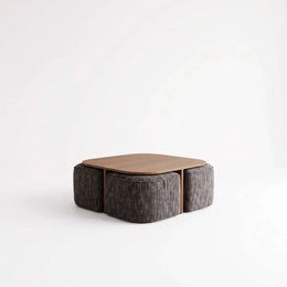 Alternate view of Makina Wooden Coffee Table with Ottomans, showing rounded tabletop for a modern living room interior.