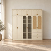 Mossylora Wardrobe with Storage Cabinet featuring three lower drawers alongside upper cupboards beside a bedroom window.