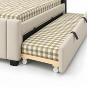 Movcopper Beige Kids Trundle Bed detail of the rolling underbed, black pull handles and beige padding beside checked bedding.