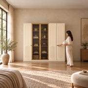 Porteriy 5 Door Wooden Wardrobe, tinted display doors and cream arch-panel doors, with a woman at the front of the wardrobe.