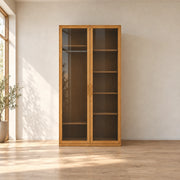 Porteriy 2 Door Wooden Closet Cabinet in a furnished bedroom, showing long slim pulls alongside visible interior shelves.