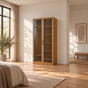 Porteriy 2 Door Wooden Closet Cabinet displays dark door edging together with long slim pulls beside a bedroom window.