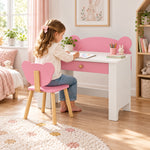 Qasbora Bear Kids Study Desk with Chair: a pink bear-ear back panel beside a child seated at the table on a patterned rug.