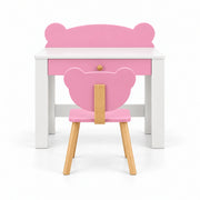 Qasbora Bear Kids Study Desk with Chair, showing splayed wooden chair legs and a single pink drawer viewed from the front.