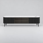 Raveliono White Marble Top TV Unit: dark glass centre storage, slim black legs and rounded ends against a grey backdrop.