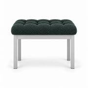 Dark green fabric cushioning on the Rebosy Pedicure Footrest, with deep button tufting plus four straight metal legs.