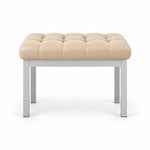 Rebosy Pedicure Footrest has a cream beige leather cushion over deep button tufting, with four straight metal legs.