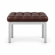 Rebosy Pedicure Footrest with a brown leather top, four straight metal legs and deep button tufting on a white backdrop.