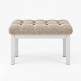 Rebosy Pedicure Footrest brings together four straight metal legs and deep button detailing against a white backdrop.
