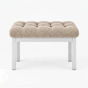 Rebosy Pedicure Footrest brings together four straight metal legs and deep button detailing against a white backdrop.