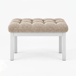 Rebosy Pedicure Footrest brings together four straight metal legs and deep button detailing against a white backdrop.