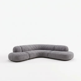 Alternate view of Romensia Grey Curved 5-Seater Sofa, showing curved sectional design for a modern living room interior.