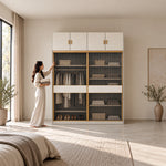 Sazfilora 2 Glass Sliding Door Closet Cabinet beside a woman reaching toward the door, showing visible interior shelves.