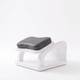 Alternate view of Showri Grey Pedicure Footrest, showing comfortable padded footrest, sturdy construction, and stable base.