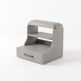 Alternate view of Steppora Grey Pedicure Footrest, showing padded footrest and front storage drawer in a modern home setting.