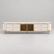 Stillvolra White Marble Top TV Unit: fine gold-tone trim, four fluted drawers and a white marble top against a grey backdrop.