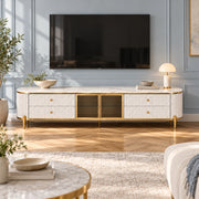 Stillvolra White Marble Top TV Unit, showing fine gold-tone trim and gold-framed glass doors beside living room seating.
