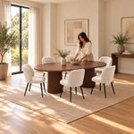 Close-up of Tavolisa Wooden Oval 6-Seater Dining Table, highlighting oval top with rounded ends in a modern home setting.