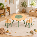 Twinboomy Flower Shaped Kids Table with 2 Chairs featuring curved wooden chair backs among playroom books and toys.