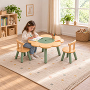 Twinboomy Flower Shaped Kids Table with 2 Chairs: curved wooden chair backs beside a child drawing on a patterned rug.