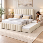 Werlisori Cream Kids Trundle Bed with a woman arranging the extended underbed, showing a matching padded footboard.