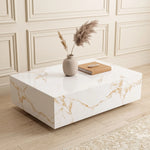 Lumi Solid Surface Gold White Coffee Table with a glossy white marble surface accented by gold veins, displayed in a minimalistic room with decorative vase and book.