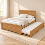 Zikroniya Wooden Kids Trundle Bed in a sunlit bedroom: framed wood panels, projecting top rails and square wooden posts.