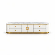 Zondinora White Marble Top TV Unit, showing circular gold-tone handles and rounded fluted ends against a white backdrop.