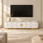 Zondinora White Marble Top TV Unit, with rounded fluted ends and circular gold-tone handles beside living room seating.