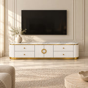 Zondinora White Marble Top TV Unit, with rounded fluted ends and circular gold-tone handles beside living room seating.
